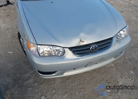 2001 Toyota Corolla Le из США, поврежденный, VIN 2T1BR12E21C470356